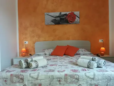 Letto o letti in una camera di Affittacamere Il FIORE