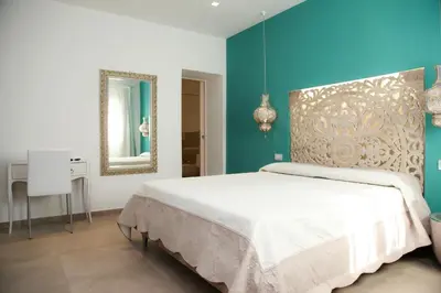 Letto o letti in una camera di Hypnos Boutique Hotel