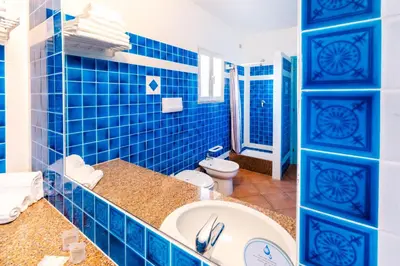 Bagno di Residence Hotel Lu Nibareddu