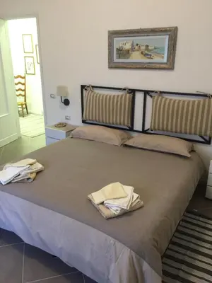 Letto o letti in una camera di B&B Piazza Dante Nuoro