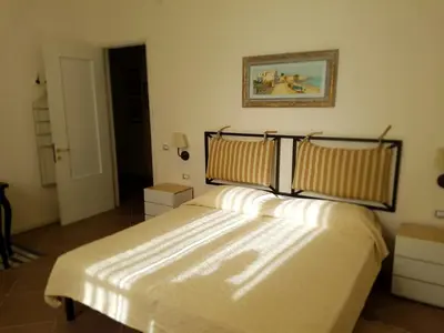 Letto o letti in una camera di B&B Piazza Dante Nuoro