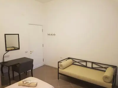Letto o letti in una camera di B&B Piazza Dante Nuoro