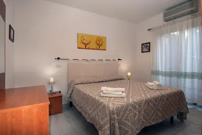 Letto o letti in una camera di Olbia Flat