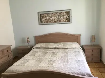 Letto o letti in una camera di Appartamenti Manuela