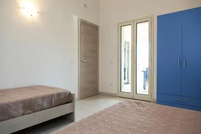 Letto o letti in una camera di San Teodoro