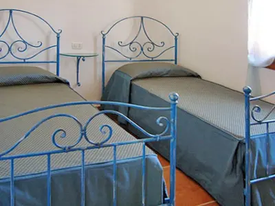 Letto o letti in una camera di Residence Bouganvillage