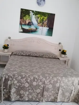 Letto o letti in una camera di Hotel Quasar