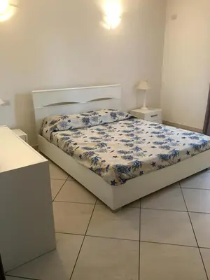 Letto o letti in una camera di Park 20 Appartamento