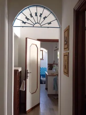 Letto o letti in una camera di Villa Gino