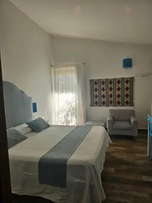 Letto o letti in una camera di Relais BeneMari