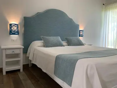 Letto o letti in una camera di Relais BeneMari