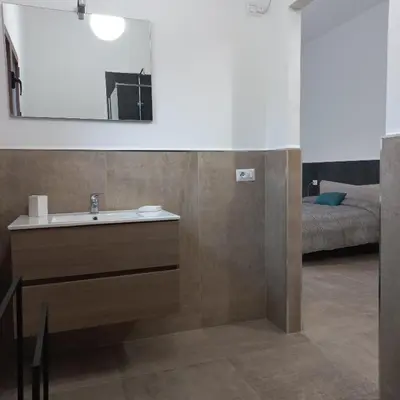 Letto o letti in una camera di Mivida 