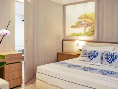 Letto o letti in una camera di Mercure Olbia