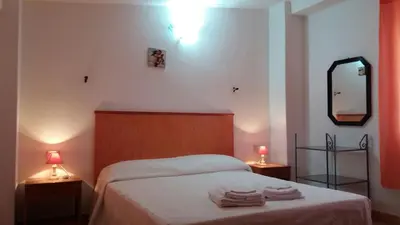 Letto o letti in una camera di Casa Lucia Campagna Relax