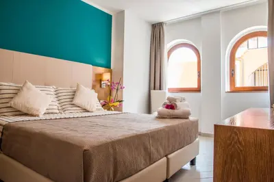 Letto o letti in una camera di Hotel Maria