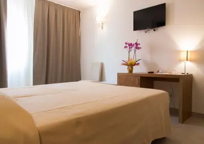 Letto o letti in una camera di Hotel Maria