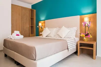 Letto o letti in una camera di Hotel Maria