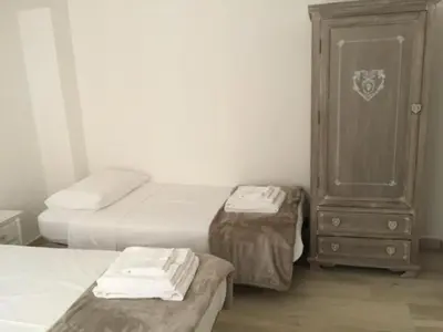 Letto o letti in una camera di Graffiti in Barbagia