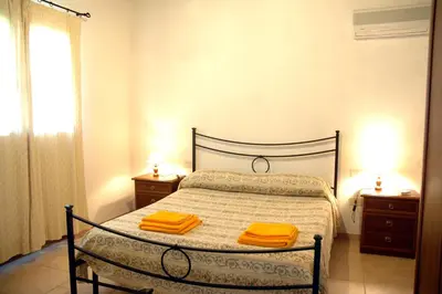 Letto o letti in una camera di Agriturismo Su Pirastru