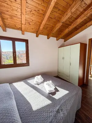 Letto o letti in una camera di Residenza Il Pappagallo