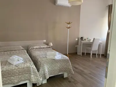 Letto o letti in una camera di Etesia