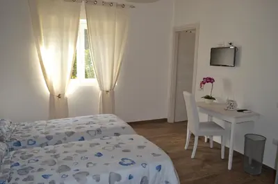 Letto o letti in una camera di Etesia