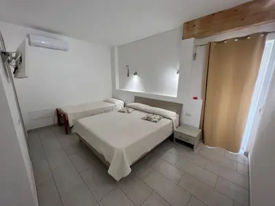 Letto o letti in una camera di Al Mare da Francesca