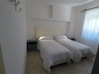 Letto o letti in una camera di Casa Degli Ulivi