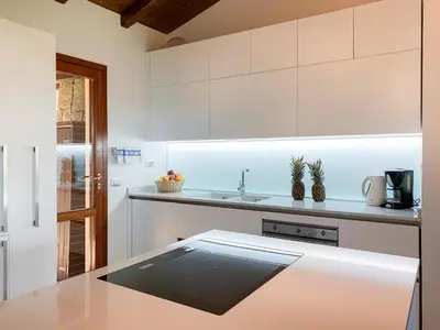 Cucina o angolo cottura di LuxRent Villa Smeralda Pool and Beach