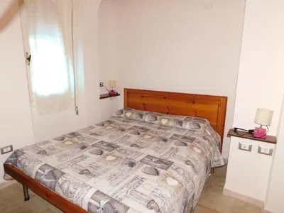 Letto o letti in una camera di Diletta
