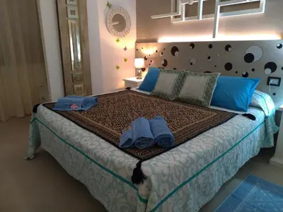 Letto o letti in una camera di Gemma Di Gallura Charme B&B