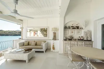 Cucina o angolo cottura di S'Abba seafront apartments - Your House in Sardinia