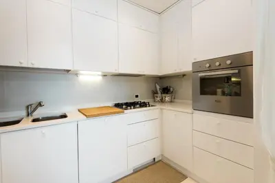 Cucina o angolo cottura di S'Abba seafront apartments - Your House in Sardinia