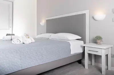 Letto o letti in una camera di Hotel Gli Ulivi