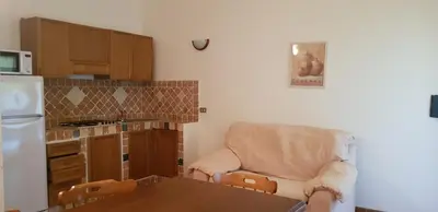 Cucina o angolo cottura di Residence Spiaggia Bianca