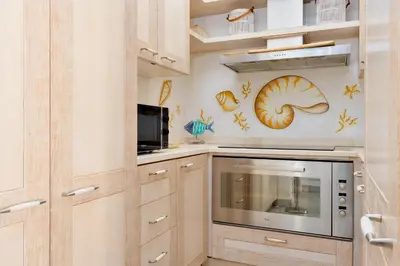 Cucina o angolo cottura di Villa Baia Caddinas