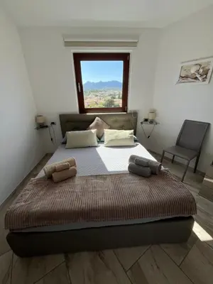 Letto o letti in una camera di b&b Florian