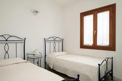 Letto o letti in una camera di Villetta Bouganville