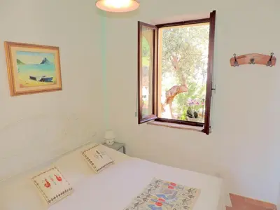 Letto o letti in una camera di Solaria - Villa Ludduì