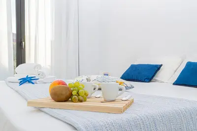 Letto o letti in una camera di Green Residence Olbia