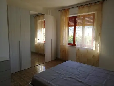 Letto o letti in una camera di Villa San Gavino