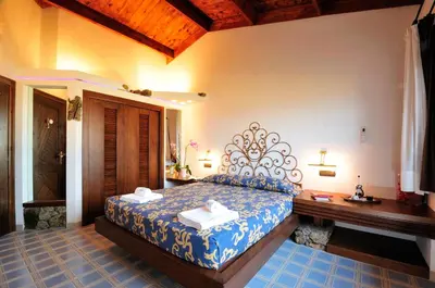 Letto o letti in una camera di Residence L'Ea di Lavru - Appartamenti Mono-Bilo-Trilocali