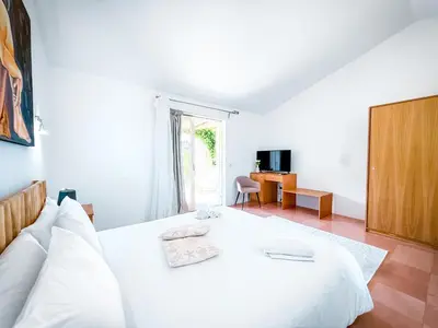 Letto o letti in una camera di Pedra Smeralda