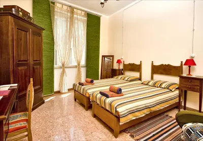 Letto o letti in una camera di Domo Silvia E Paolo