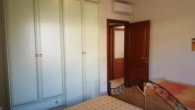Letto o letti in una camera di casa Angy