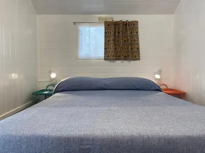 Letto o letti in una camera di Camping Car Palmasera