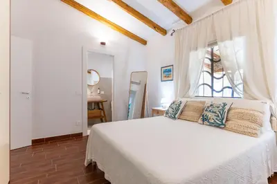Letto o letti in una camera di Villa Smeralda