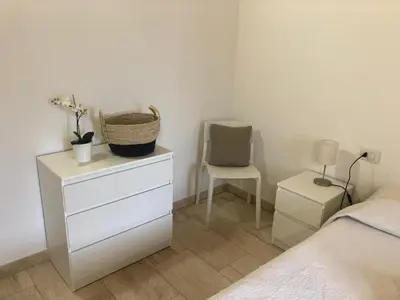 Letto o letti in una camera di Trilocale con terrazza