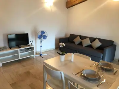 TV o dispositivi per l'intrattenimento presso Trilocale con terrazza