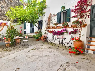 Giardino di Le Arcada - Appartamenti nel cuore del centro storico di Orosei